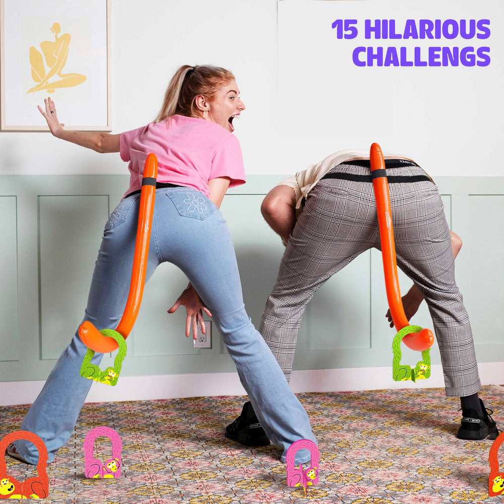 MCMILLER ENTERTAINMENT tail and rings beside a ruler for clear size and portability preview