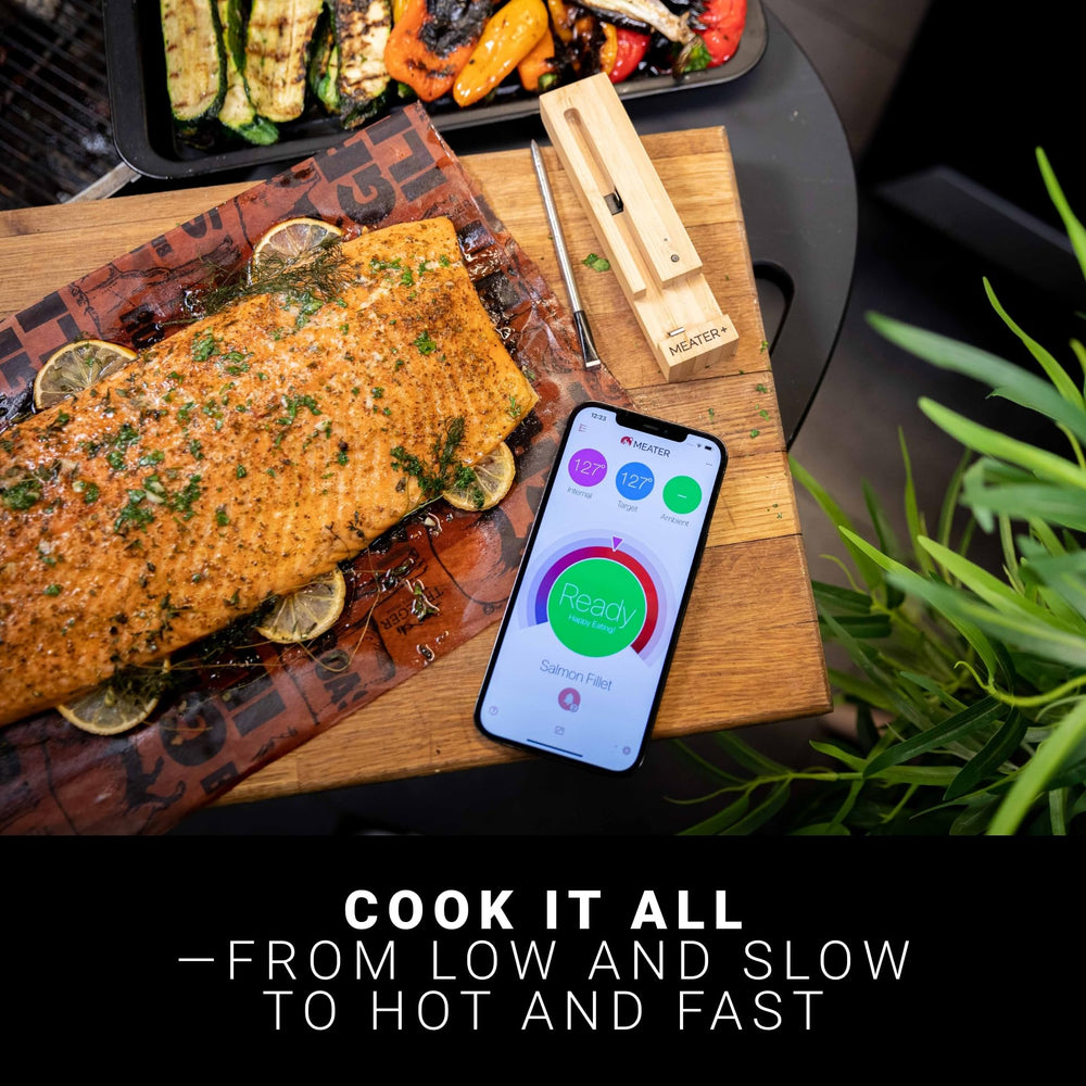 MEATER Plus probe inserted in steak on grill illustrating real-time cook monitoring benefit