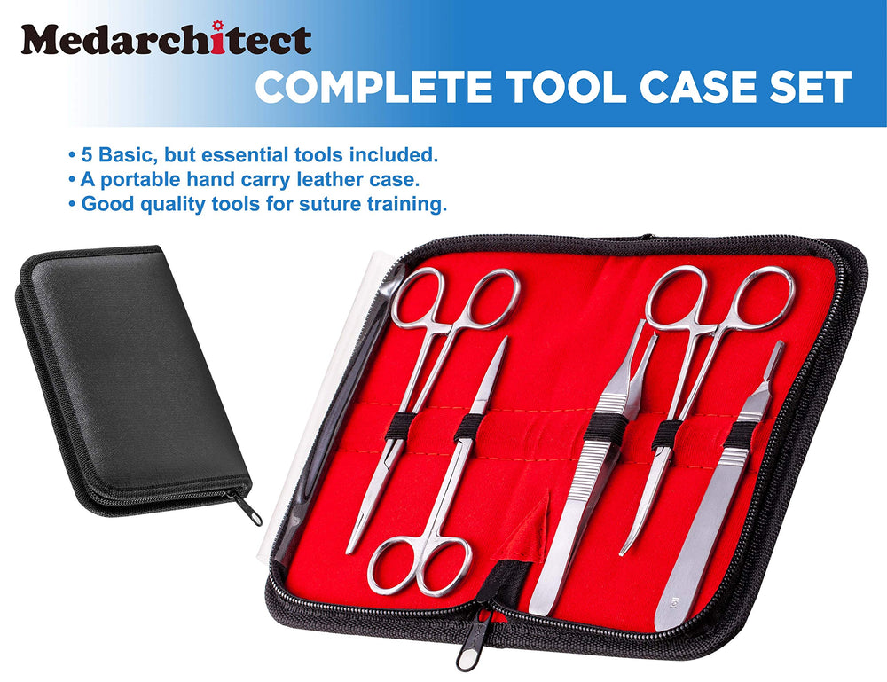 Medarchitect instruments arranged top view with needle holder, forceps and scissors for training