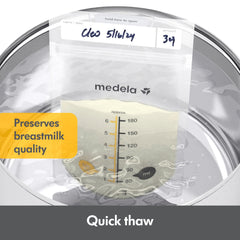 Medela flat frozen stacked bags saving freezer space and speeding thawing
