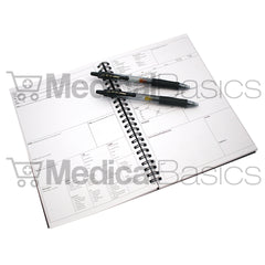 Medical Basics binding and cover detail showing premium wire bind that lays flat