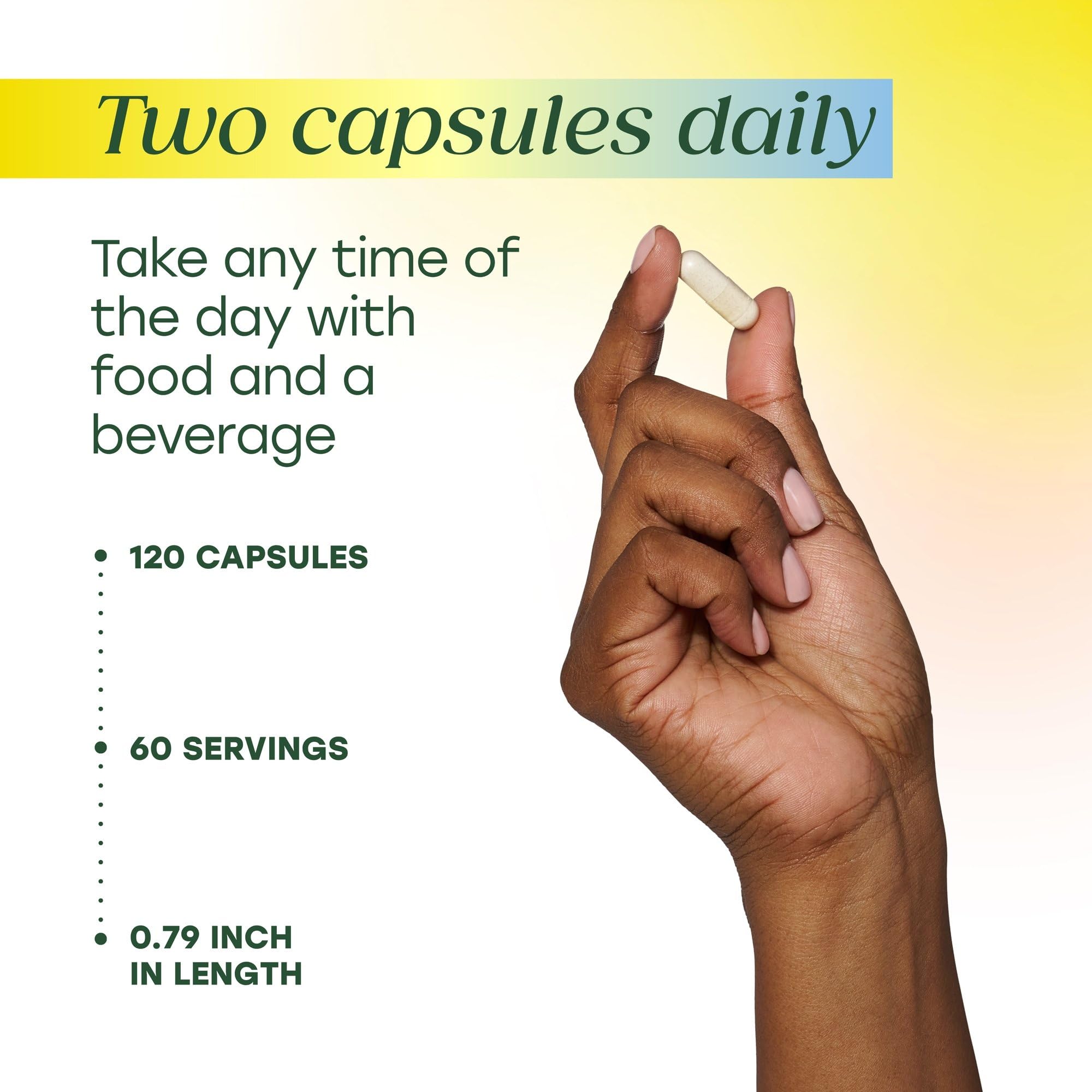MegaFood two capsules on palm to demonstrate recommended serving size