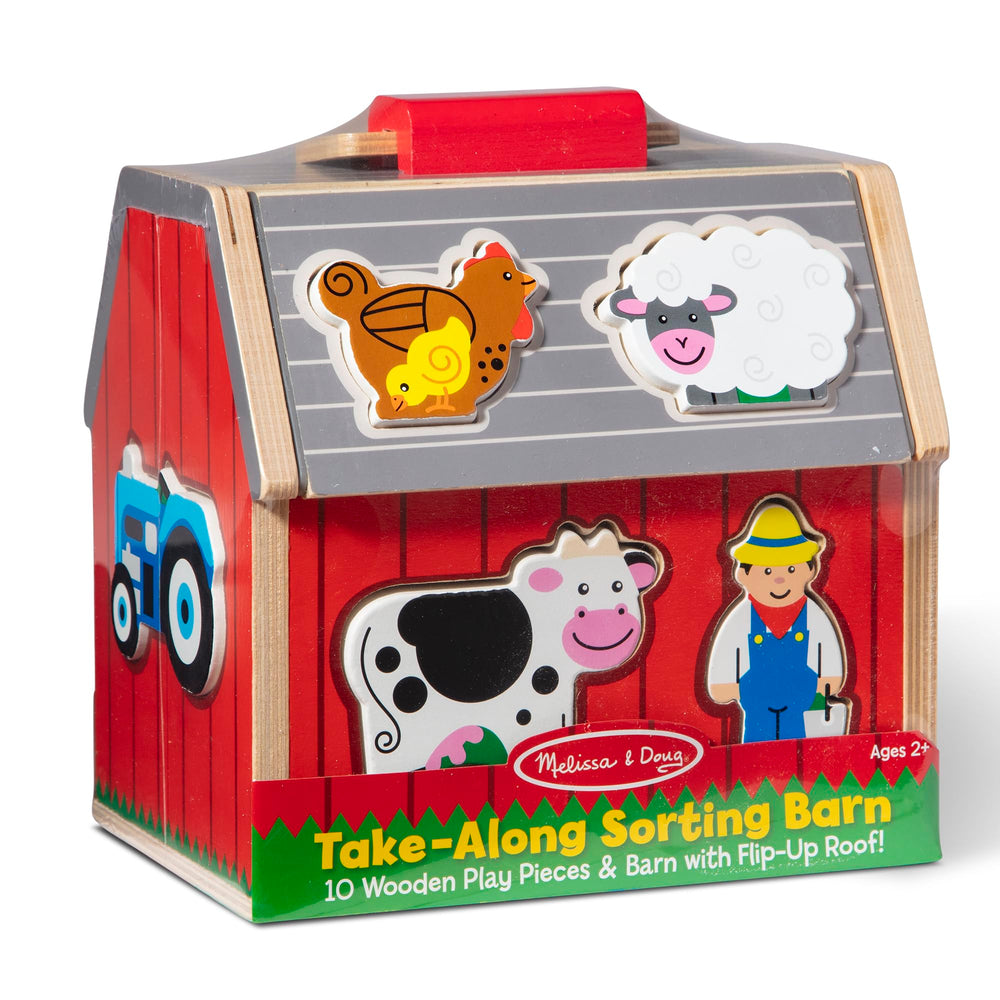 Melissa & Doug barn in a playroom with child playing, shows durable everyday use