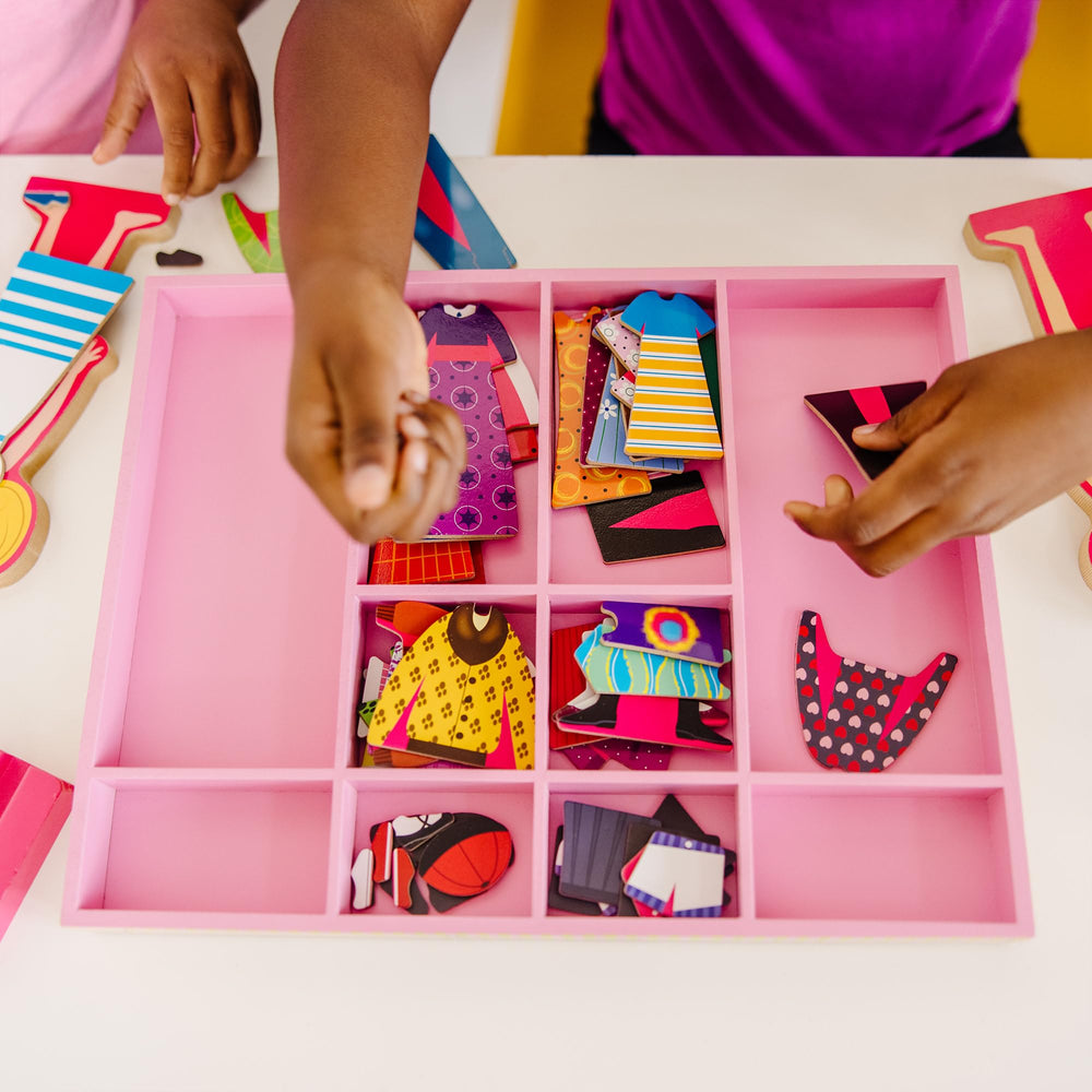 Melissa & Doug sample mix-and-match outfits illustrating hundreds of combinations