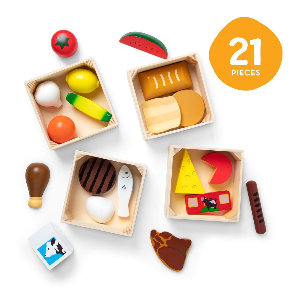 Melissa & Doug pieces in a child’s hand showing scale and easy handling