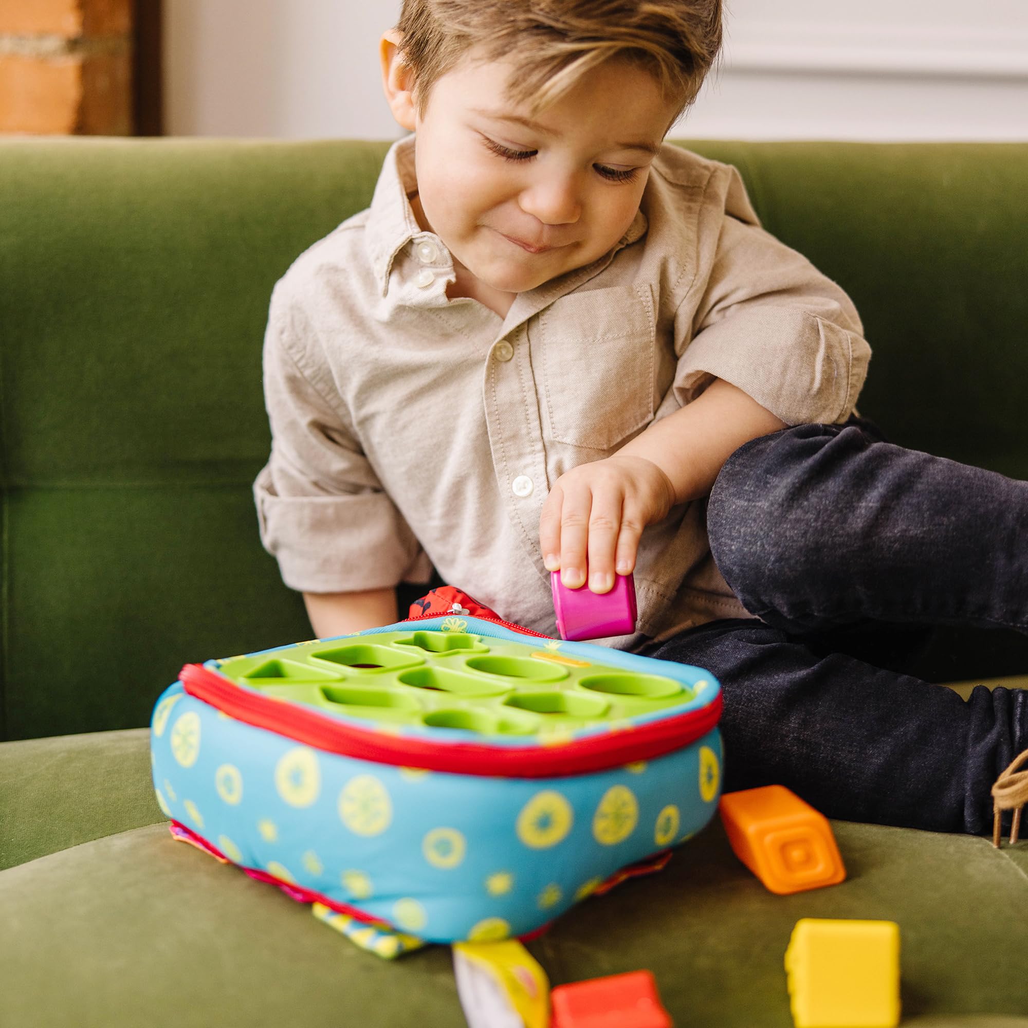 Melissa & Doug close-up of nine textured blocks highlighting tactile surfaces for sensory development