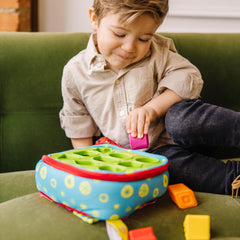 Melissa & Doug close-up of nine textured blocks highlighting tactile surfaces for sensory development