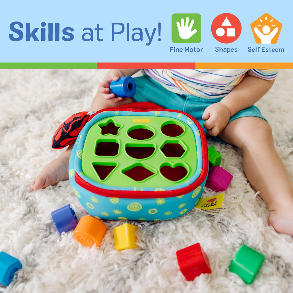 Melissa & Doug two-sided activity surface with flaps and holes encouraging varied matching and exploration