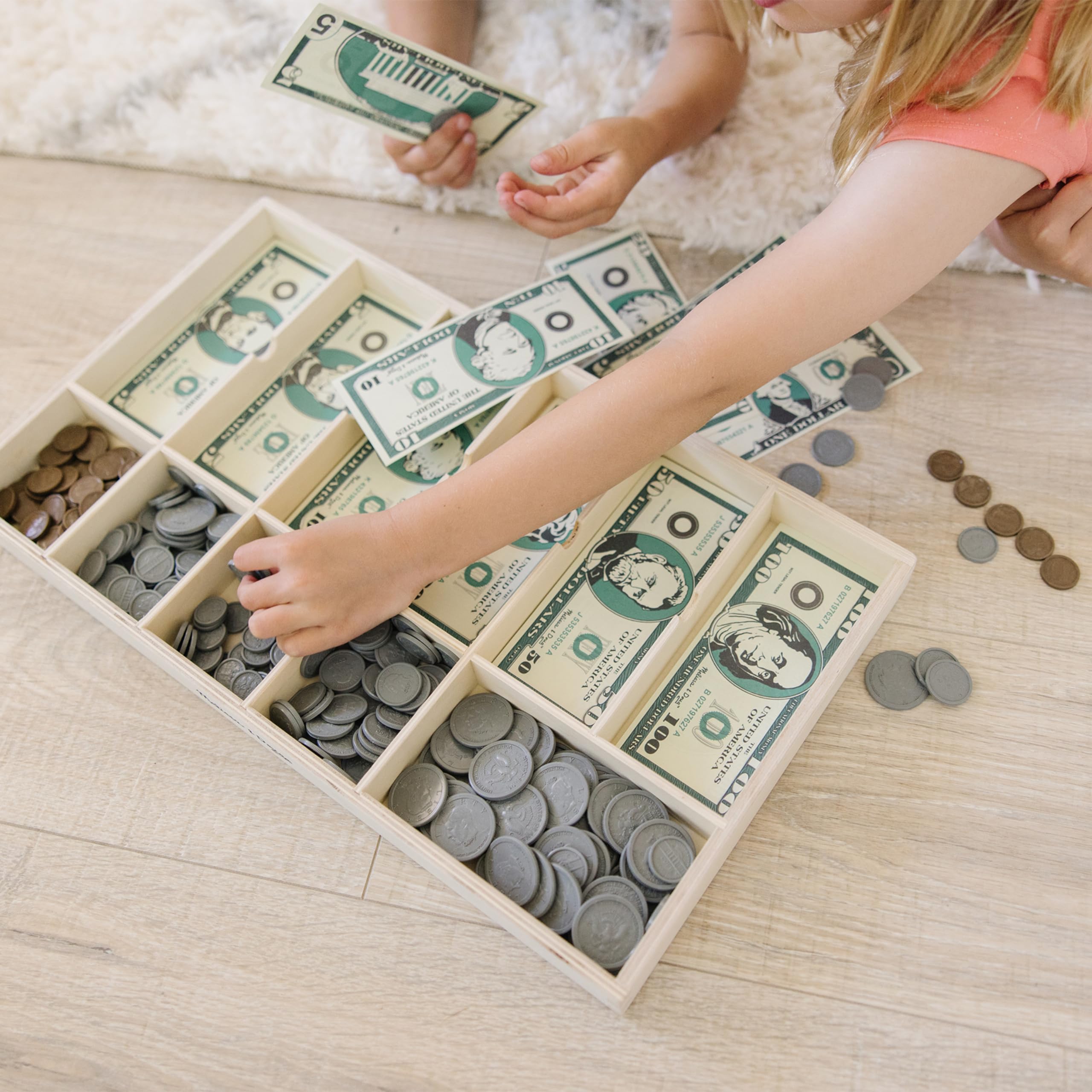 Melissa & Doug wooden cash drawer open with labeled compartments for tidy storage