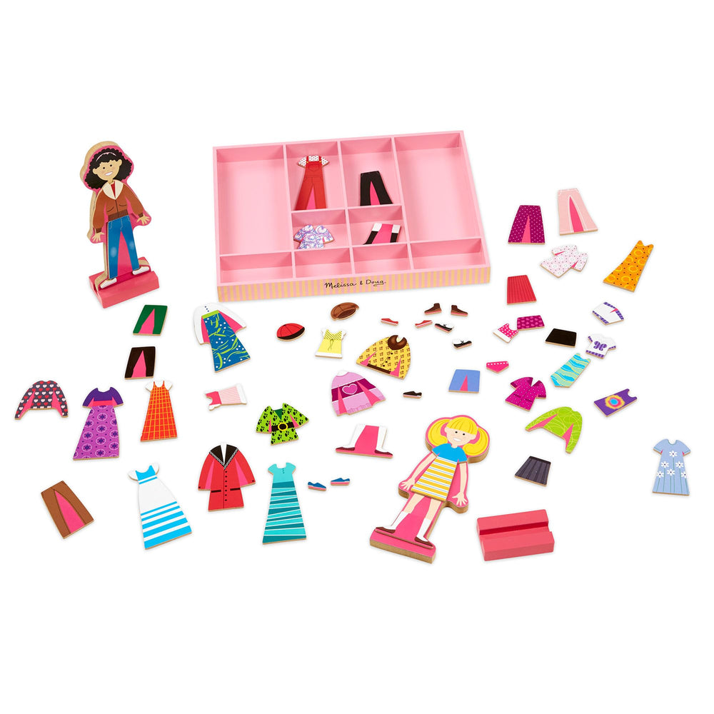 Melissa & Doug wooden stands holding dolls upright for display and role play