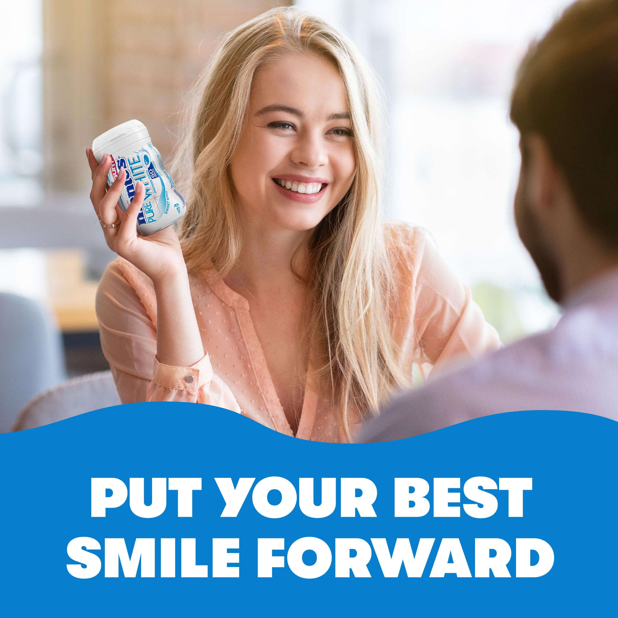MENTOS bottle on office desk suggesting workplace breath-freshening convenience