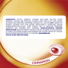 opened Mentos cinnamon bottle with visible gum pieces emphasizing resealable freshness