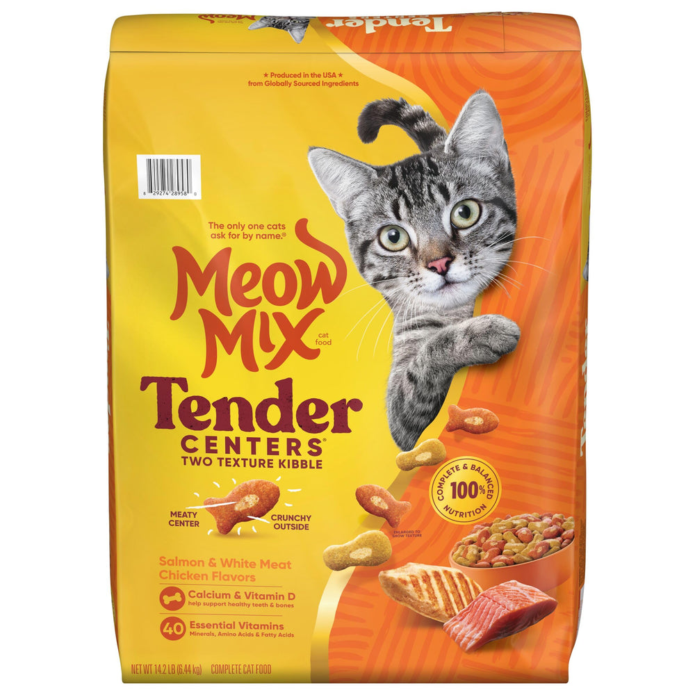 Cat enjoying Meow Mix from bowl highlighting satisfied feeding experience