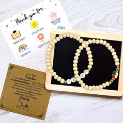 MHSMHL wood bead bracelet and heart bookmarks closeup, functional keepsakes for teachers