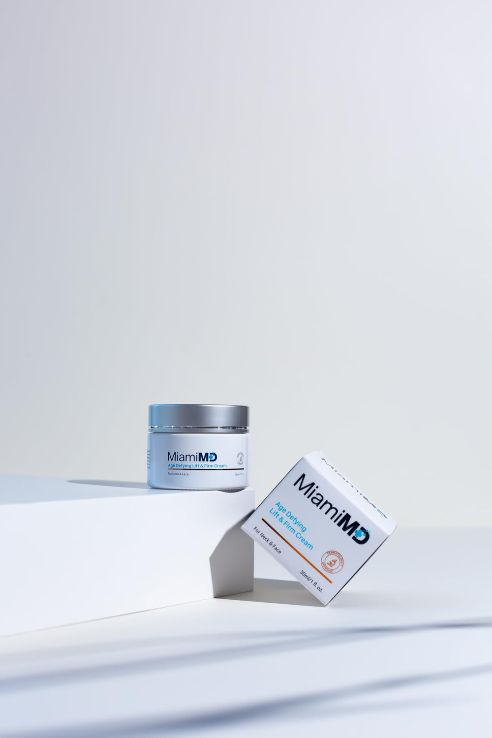 MiamiMD applying cream to jawline and neck for lifted, toned look