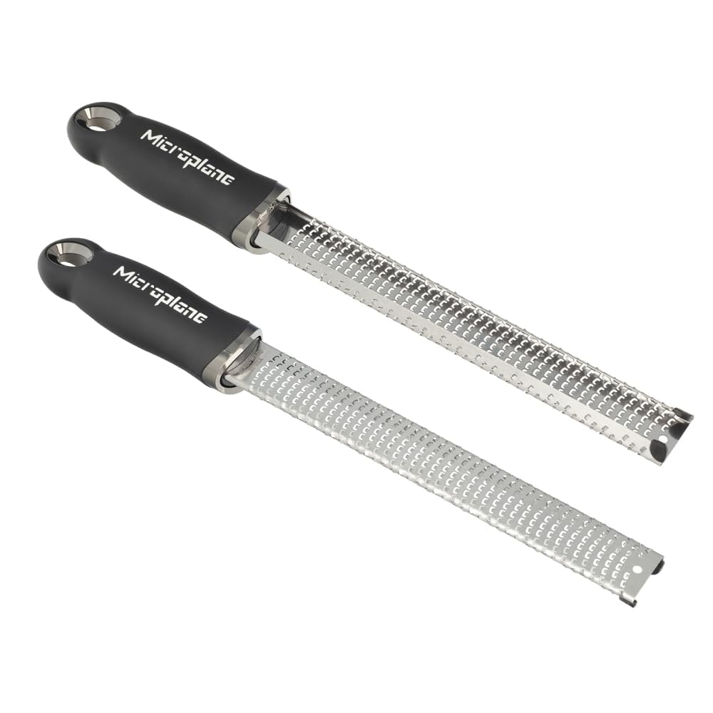 Microplane blade close-up showing ultra-sharp teeth for precise grating