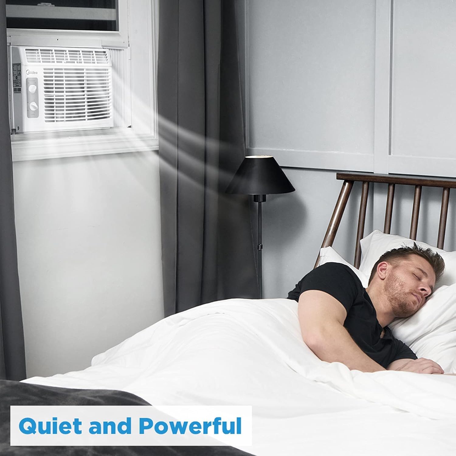 Midea beside furniture for scale showing suitability for small rooms