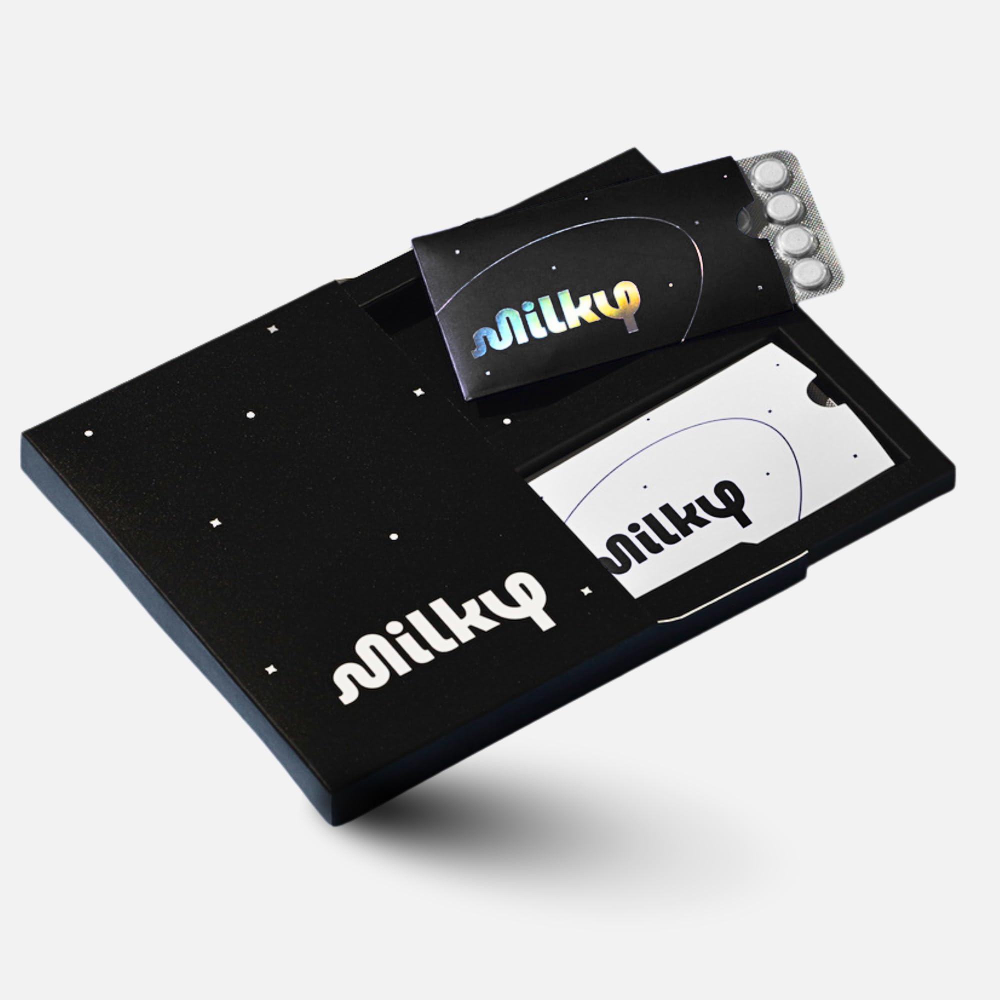Milky front packaging Cosmic Black showing compact tablet pack and sleek design
