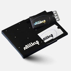 Milky front packaging Cosmic Black showing compact tablet pack and sleek design