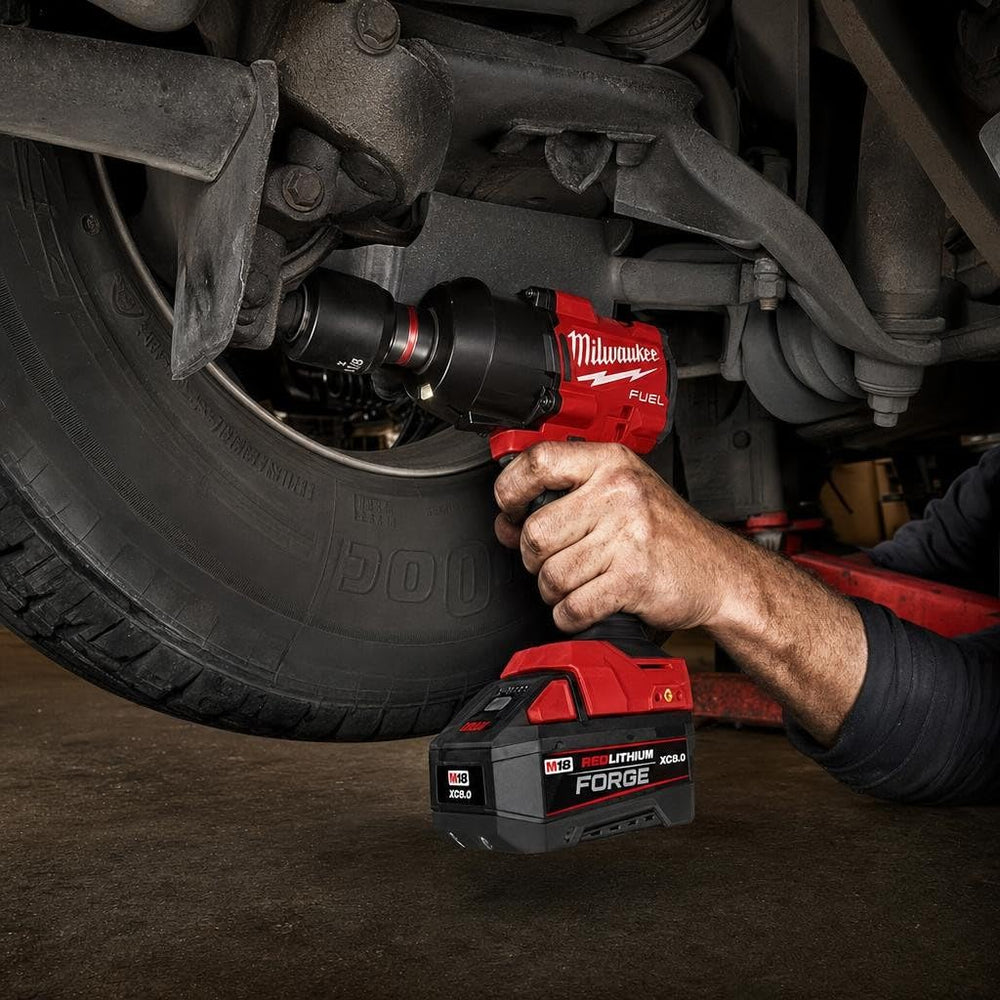 Milwaukee in use on a car lug nut demonstrating high-torque removal capability