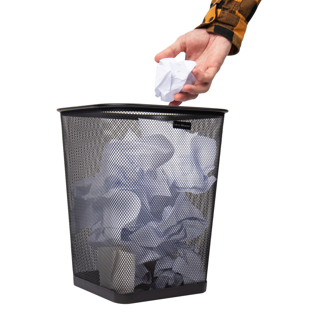 Mind Reader trash can in bathroom corner showing compact fit and moisture ventilation