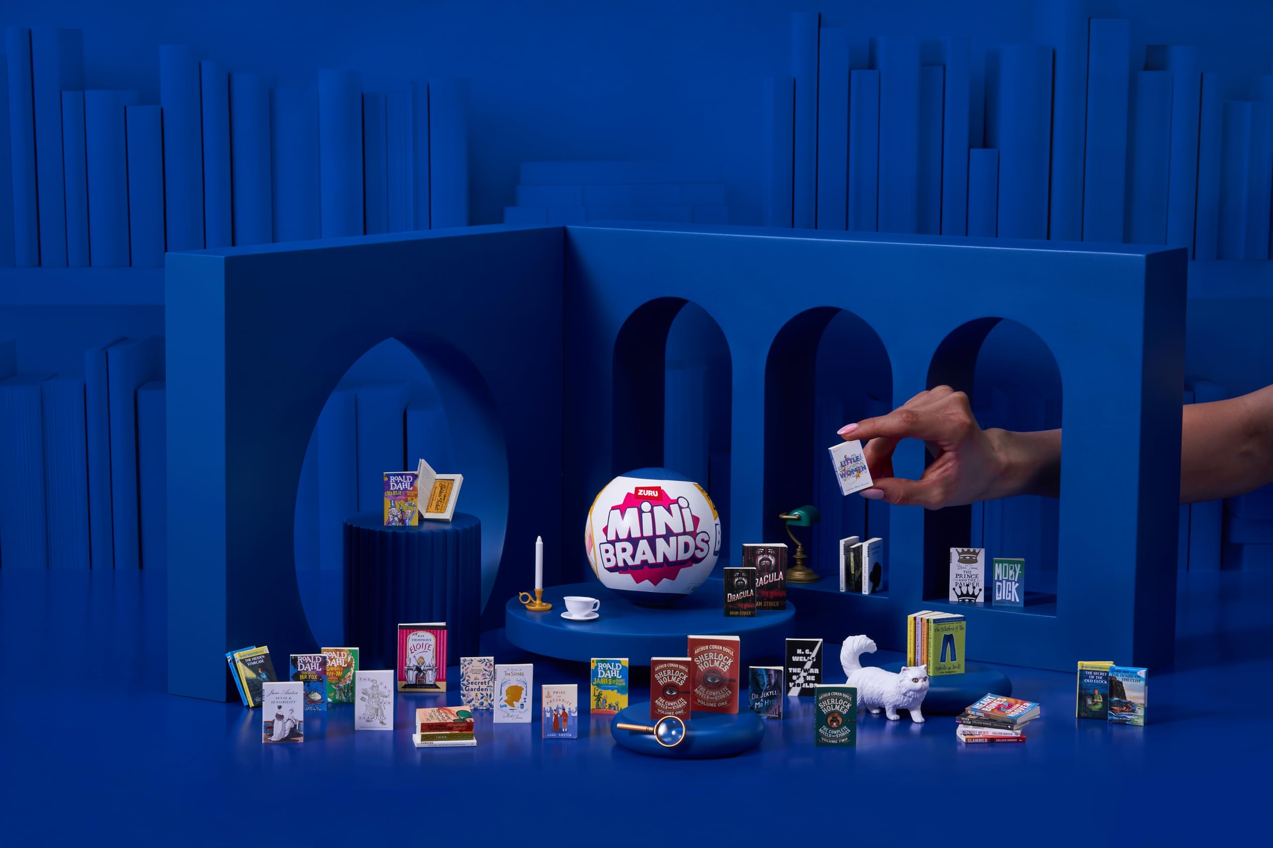 Mini Brands mini books arranged on a shelf illustrating compact display benefit