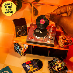 MGA's Miniverse decorative mini speakers and furniture piece displayed for collectible setup