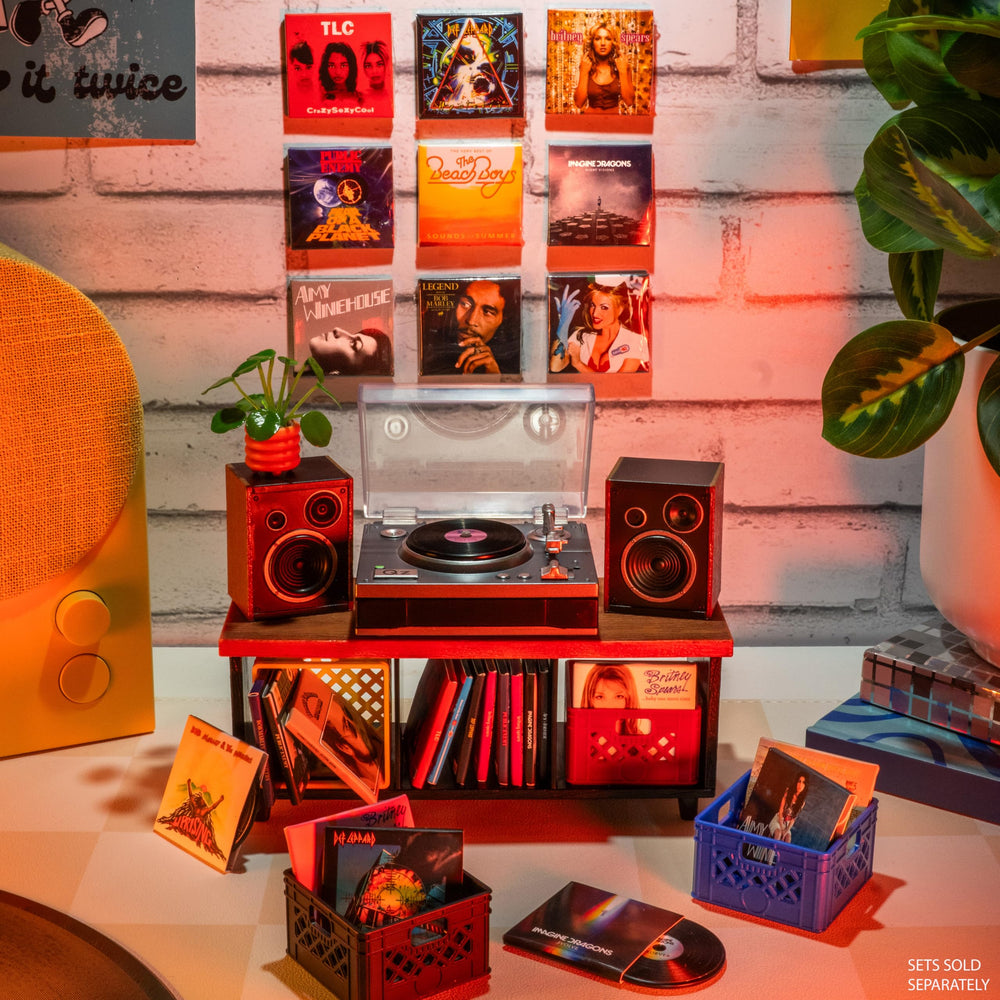 MGA's Miniverse held in hand to show scale and portability, ideal for pocket-sized collections