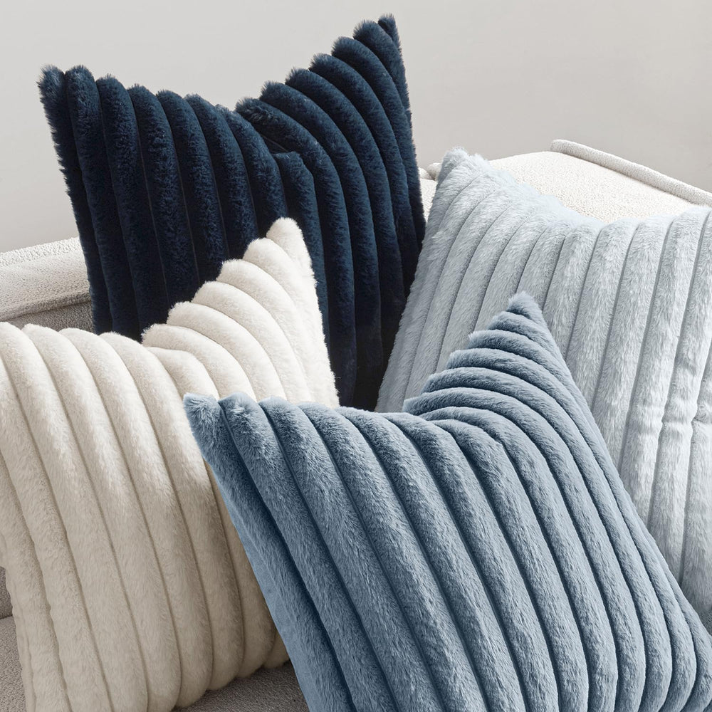 MIULEE two pillows on sofa adding navy contrast and cozy feel