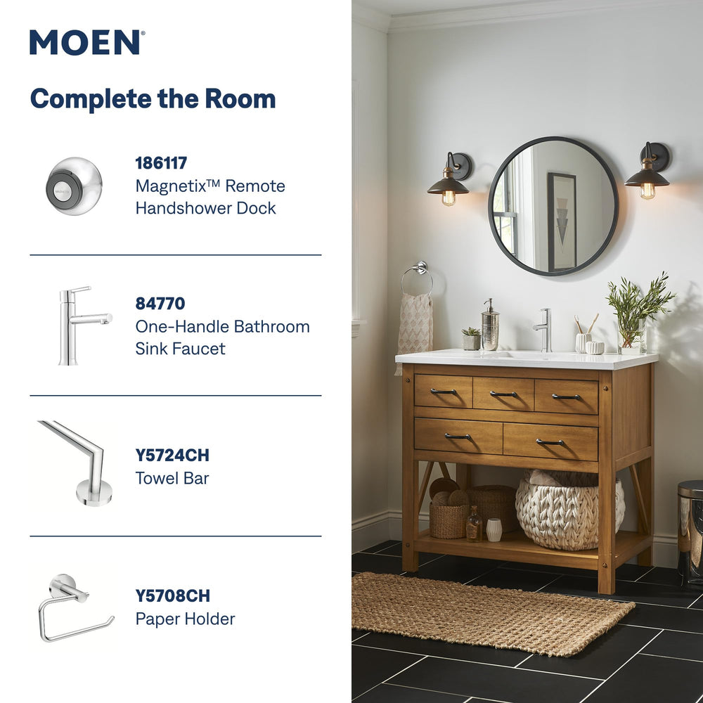 Moen showerhead next to ruler showing 9-inch length for scale and fit