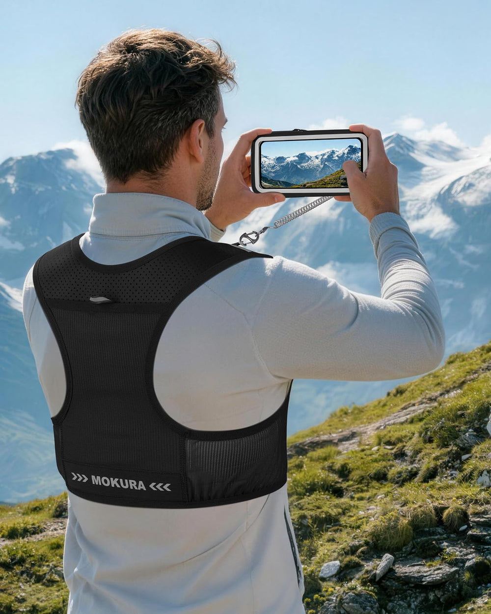 MOKURA vest next to hand showing compact size and lightweight carry