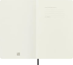 Moleskine expanded inner pocket open with receipts illustrating organized document storage