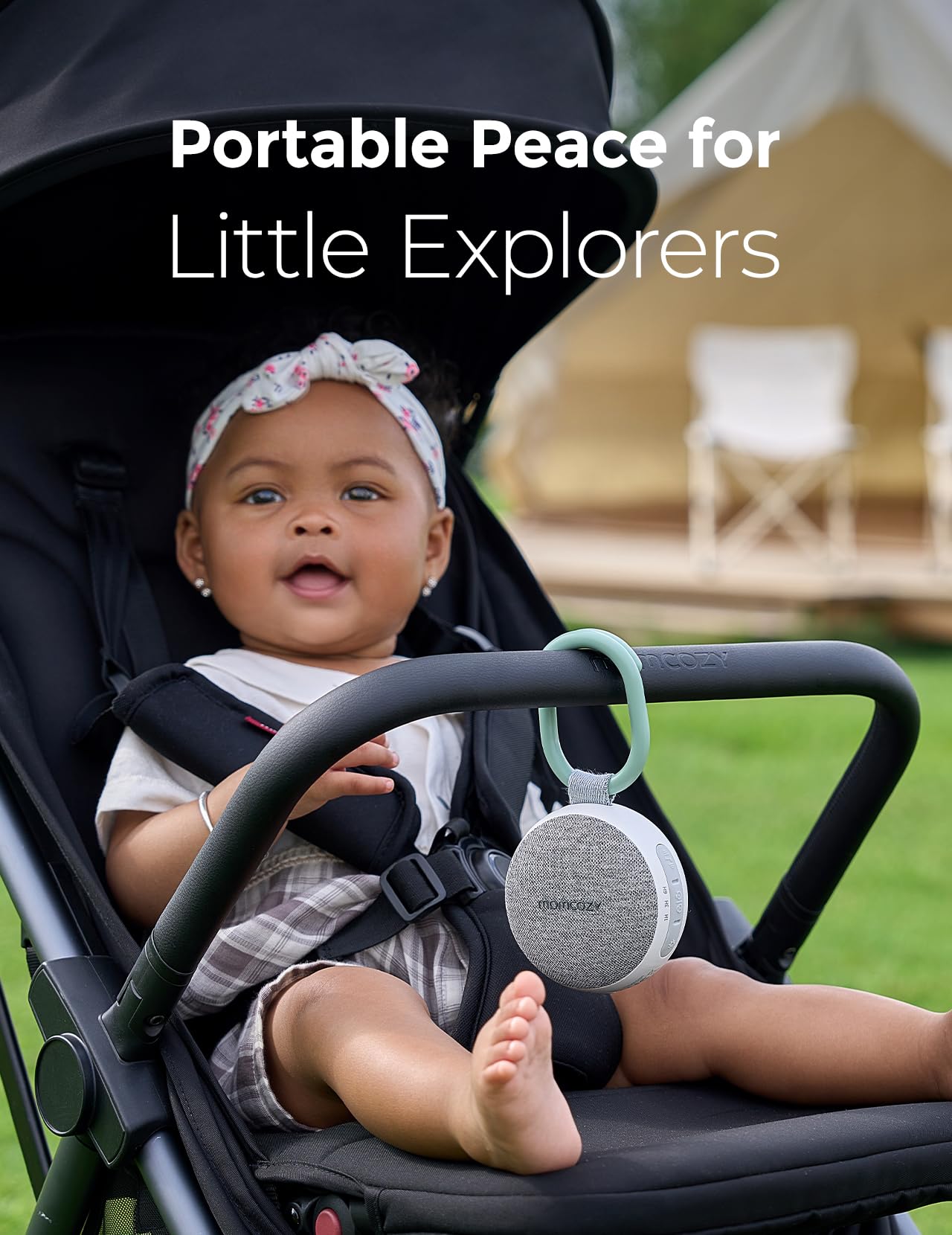 Momcozy clipped to a stroller showing secure attachment for on-the-go naps