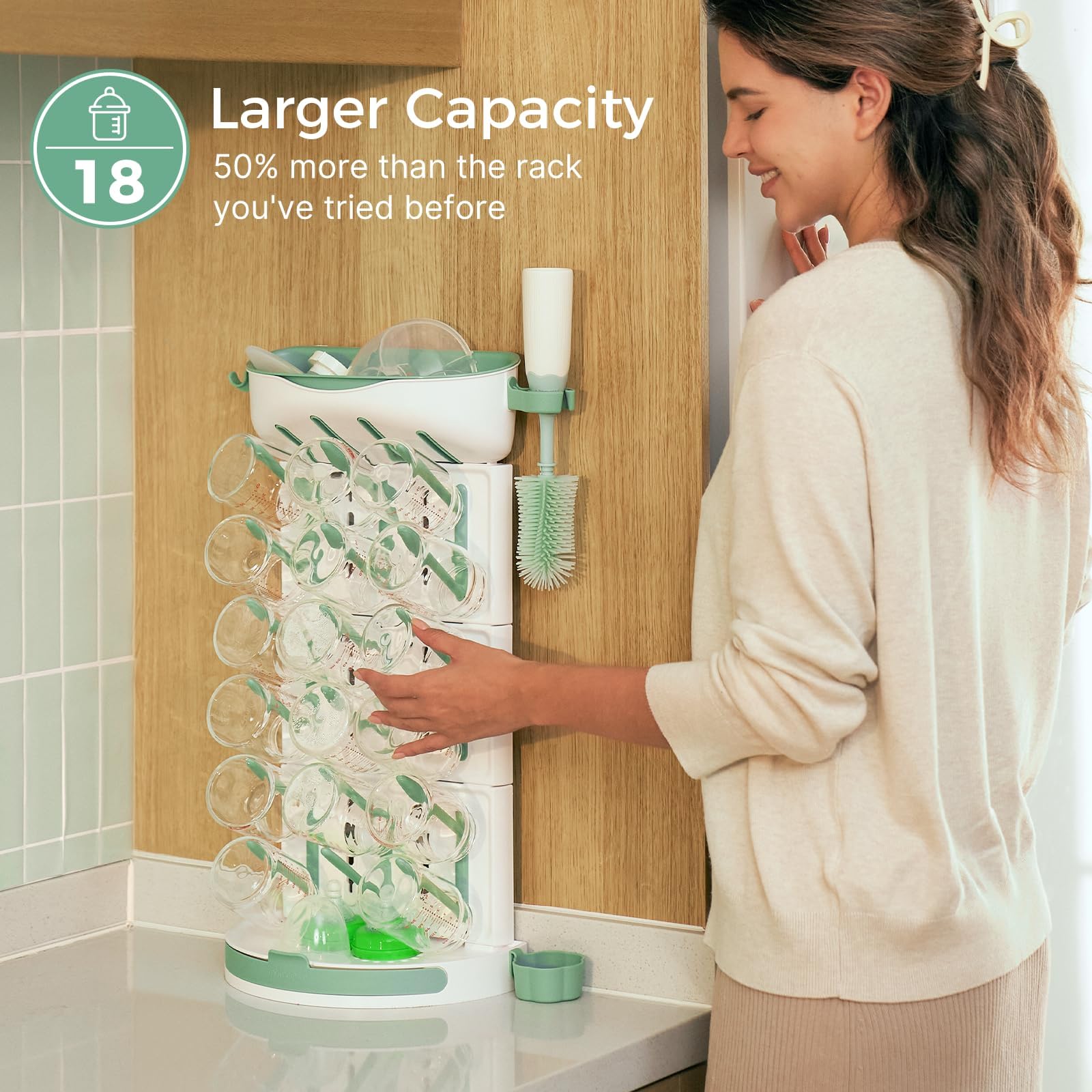 Momcozy close-up of adjustable pegs demonstrating stable bottle support