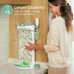 Momcozy close-up of adjustable pegs demonstrating stable bottle support