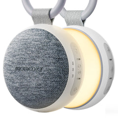 Momcozy front view showing compact white device and clip for portable sleep support