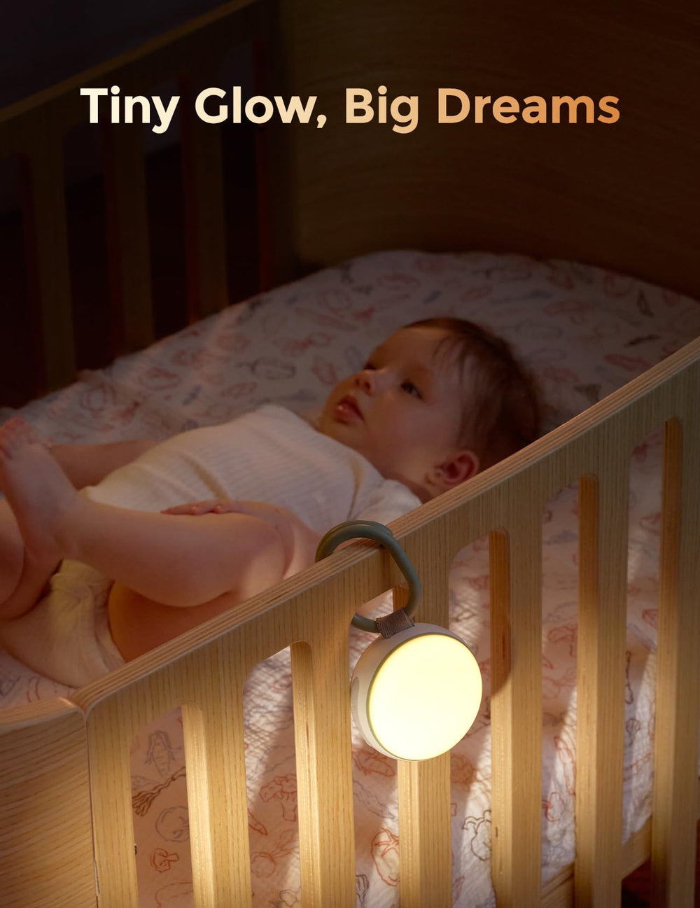 Momcozy amber nightlight glowing on crib providing soft illumination for feeds