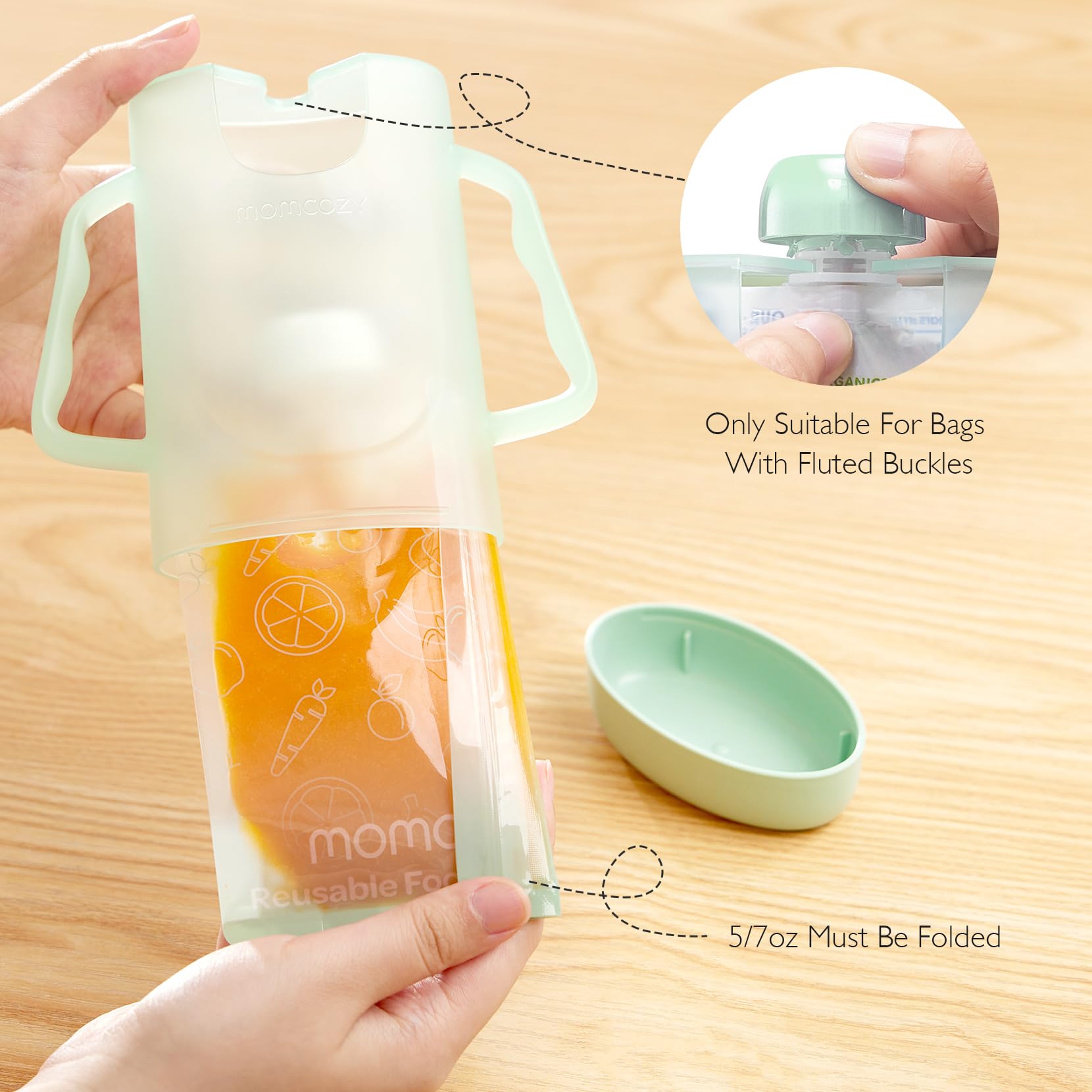 Momcozy next to a baby bottle showing scale and compact countertop footprint