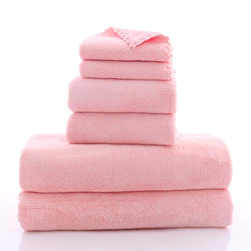 MOONQUEEN towels rolled in a suitcase showing travel-friendly compactness