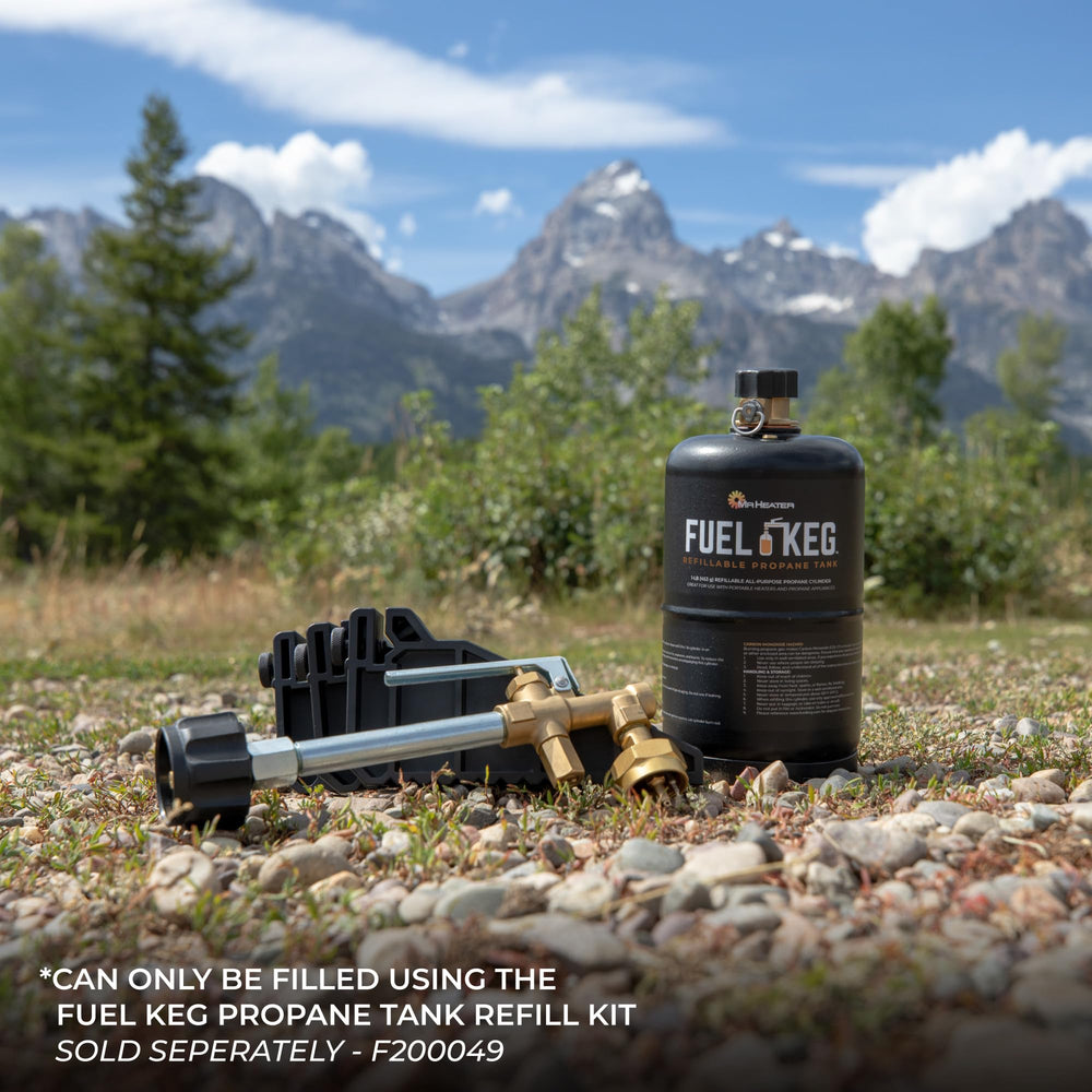 Mr. Heater Fuel Keg held in hand illustrating compact 1 lb size and easy transport