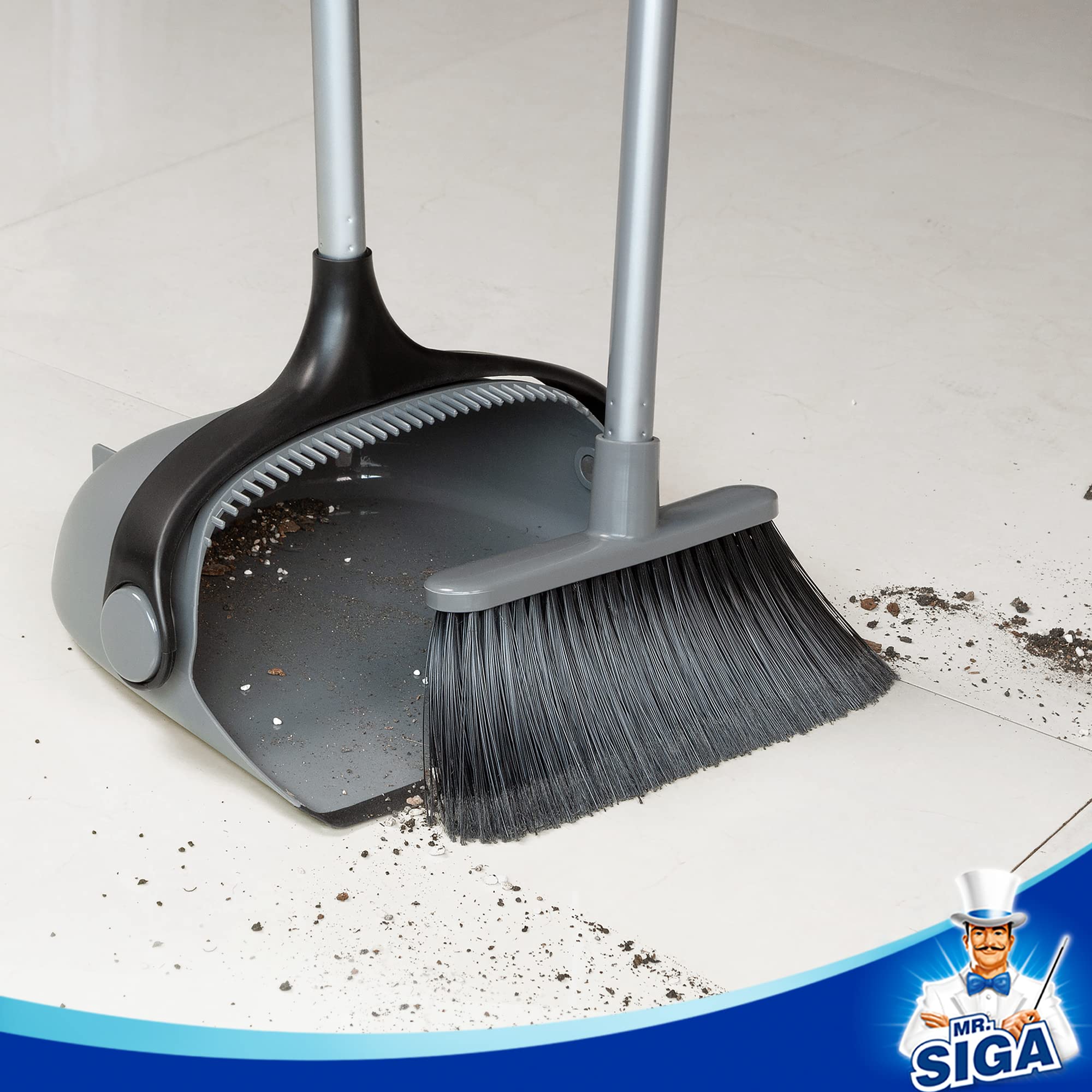 MR.SIGA broom in use sweeping kitchen floor capturing crumbs and pet hair