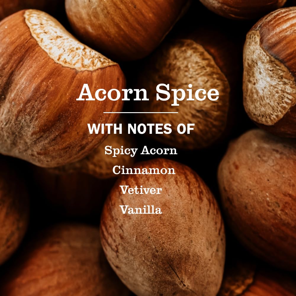 Mrs. MEYER'S label close-up highlighting Acorn Spice scent and ingredient clarity benefit