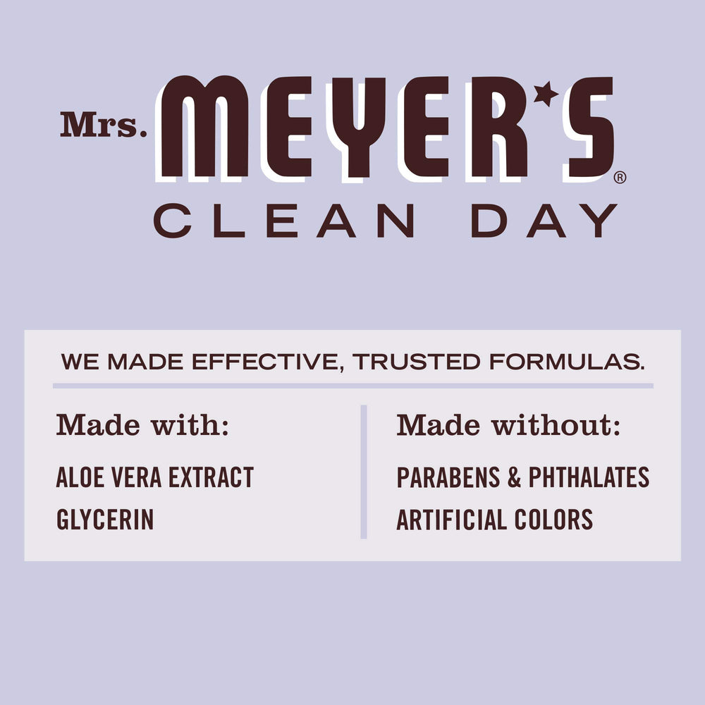Mrs. Meyer's lavender bottle being used from hand showing easy on-the-go sanitizing benefit