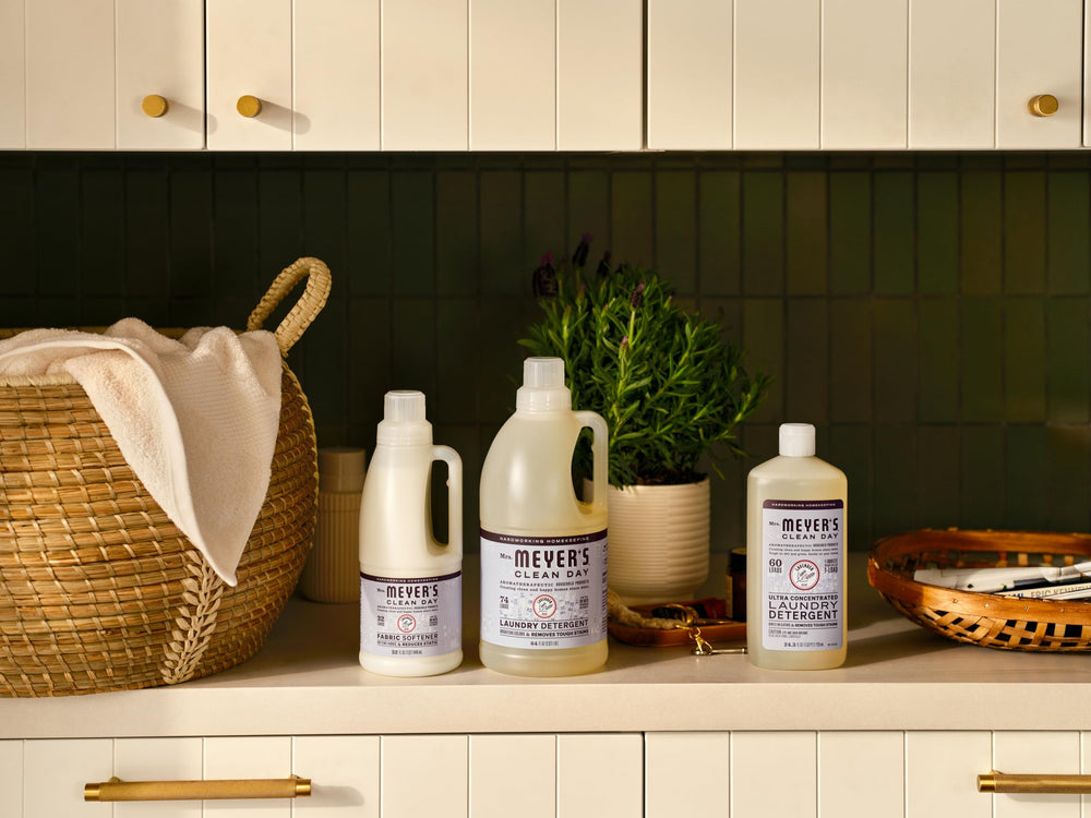 Mrs. Meyer's bottle in a bright laundry room conveying natural scent