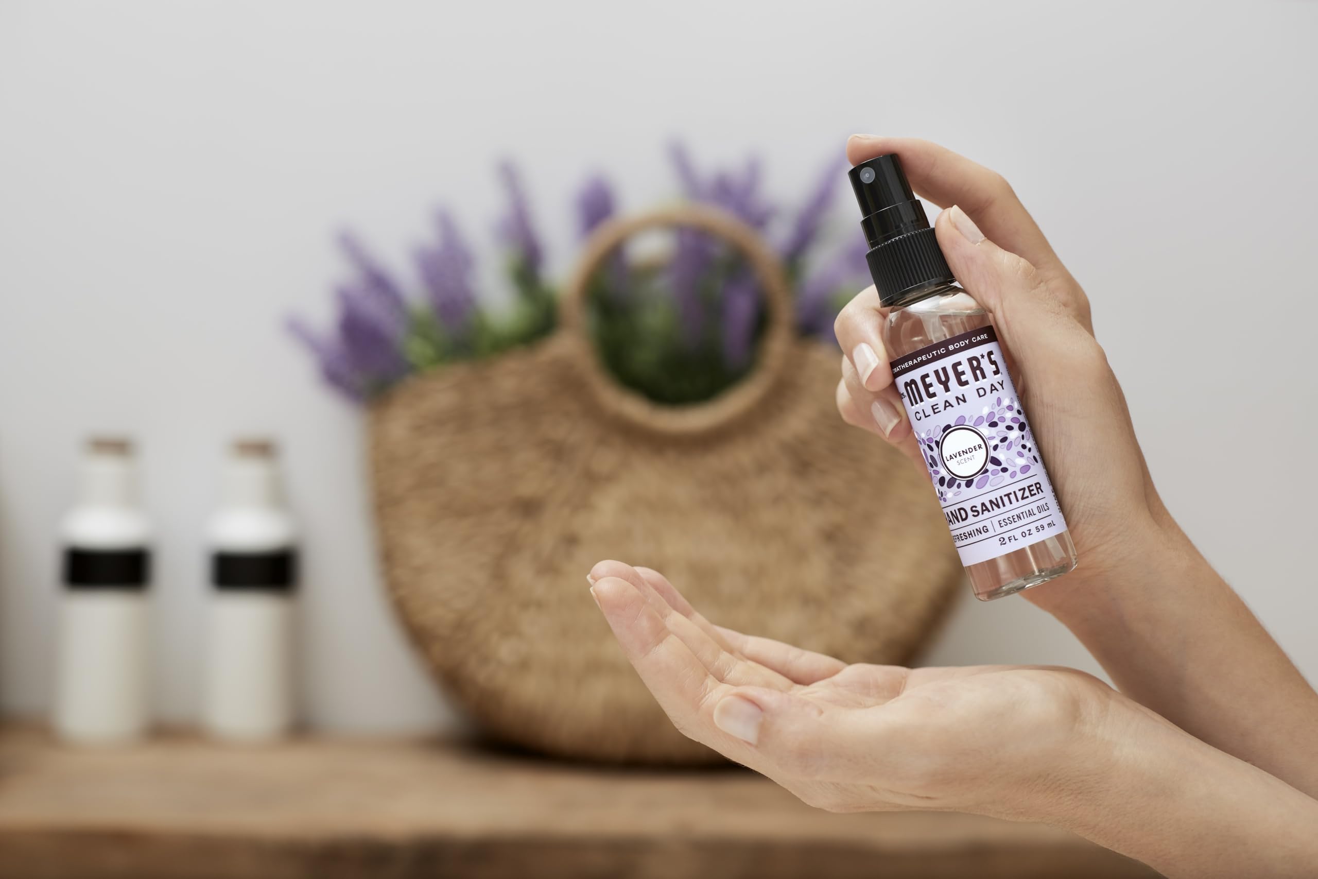 Mrs. Meyer's lavender spray tucked into a tote bag showing convenient portability and scent