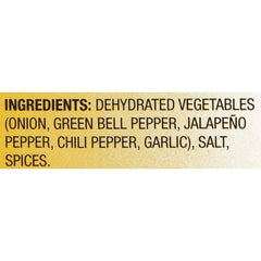 Mrs. Wages salsa mix added to bowl with tomatoes for fast prep