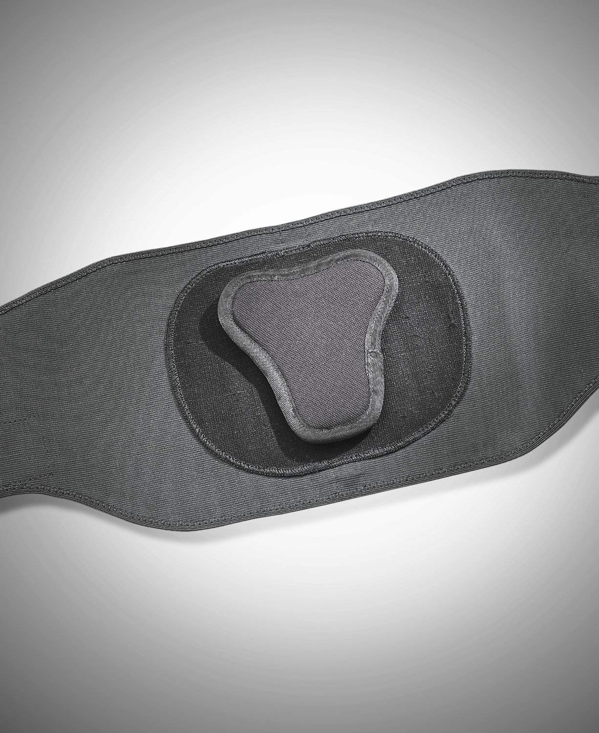 MUELLER brace beside measuring tape highlighting size range and fit guidance