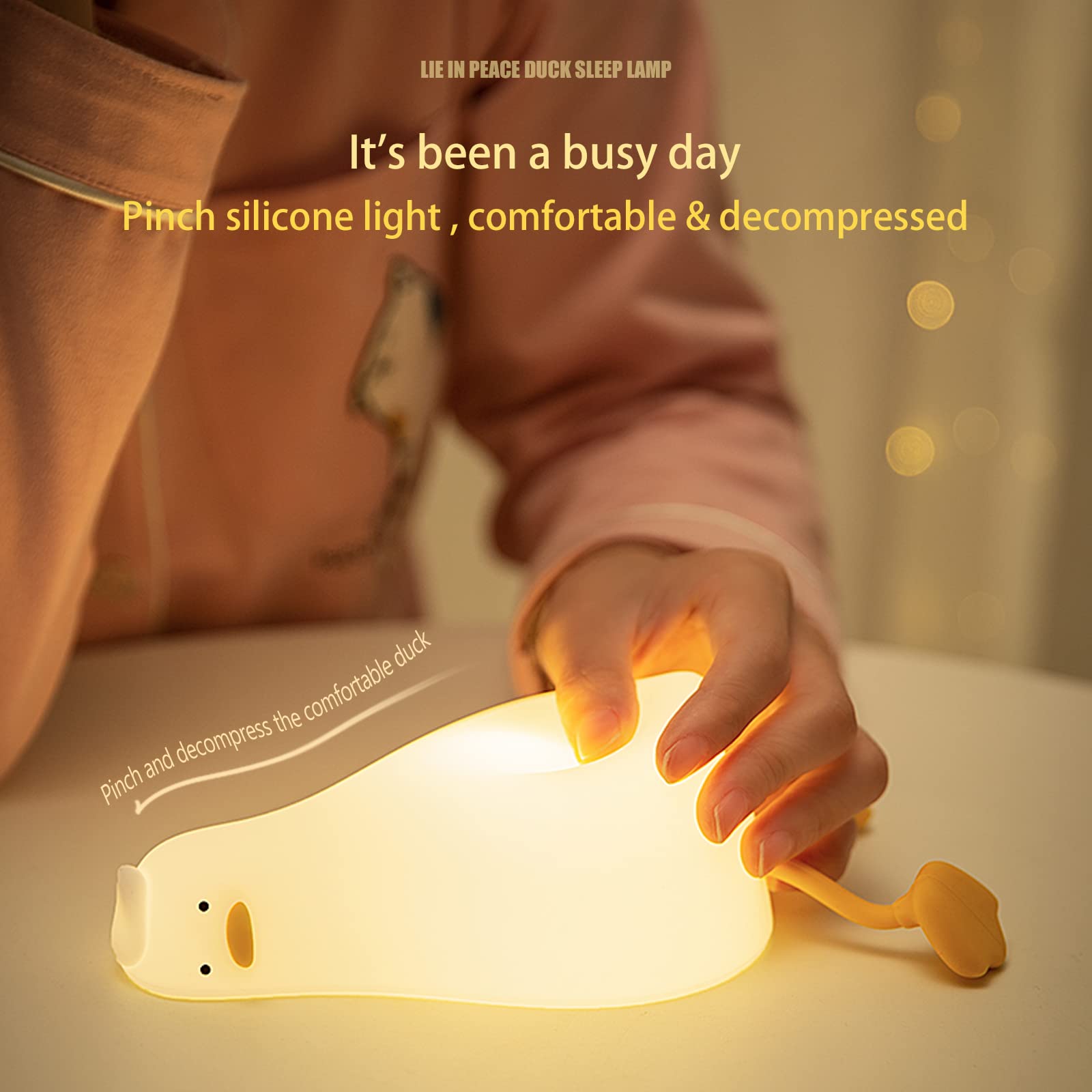 MUID Benson Duck on a bedside table at night providing gentle reading and night light ambiance