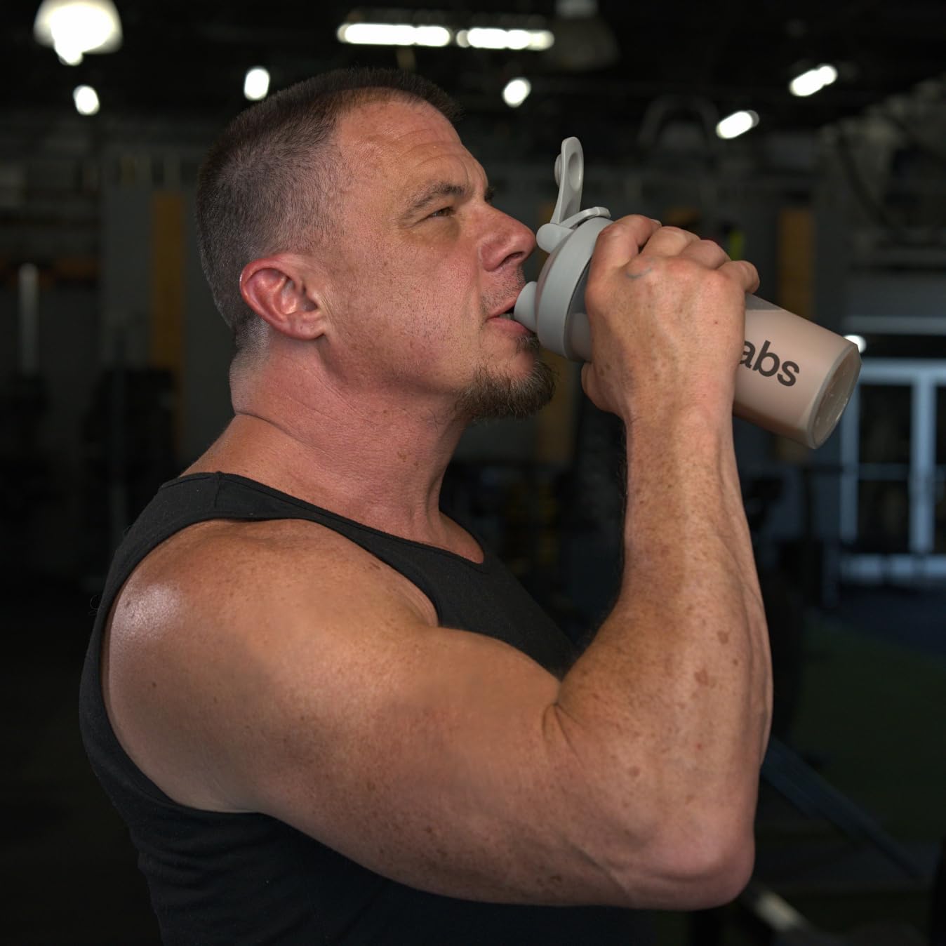Muscle Defense served in glass after workout for fast recovery