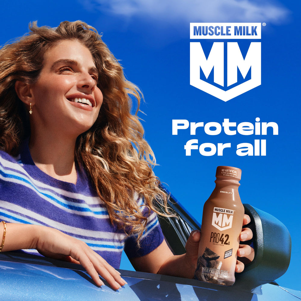 Muscle Milk cookies 'n creme spoonful highlighting flavor and appeal